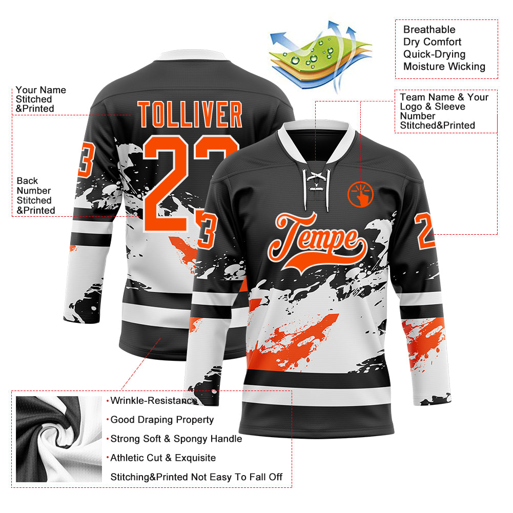 Custom Black Orange-White Abstract Splatter Paint Hockey Lace Neck Jersey